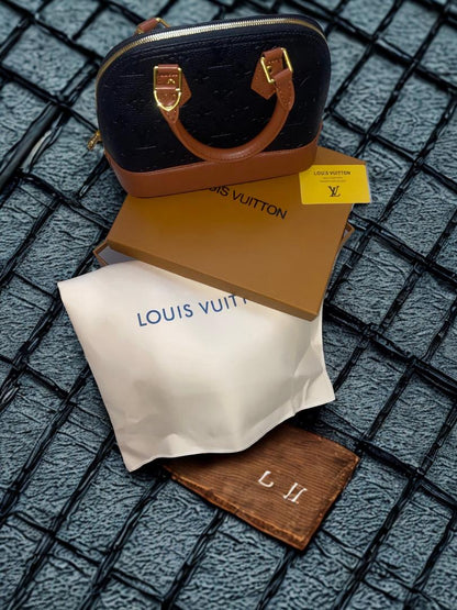 Sac a main Louis Vuitton© bb Alma