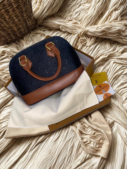 Sac a main Louis Vuitton© bb Alma